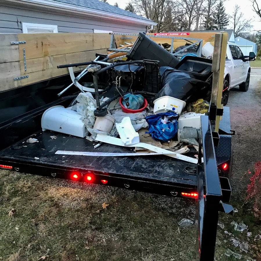 Roll-off dumpster delivered to a residential driveway in Ravena